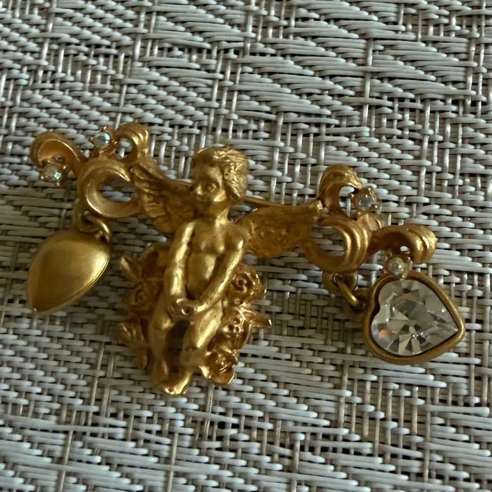 Kirks Folly cherub brooch